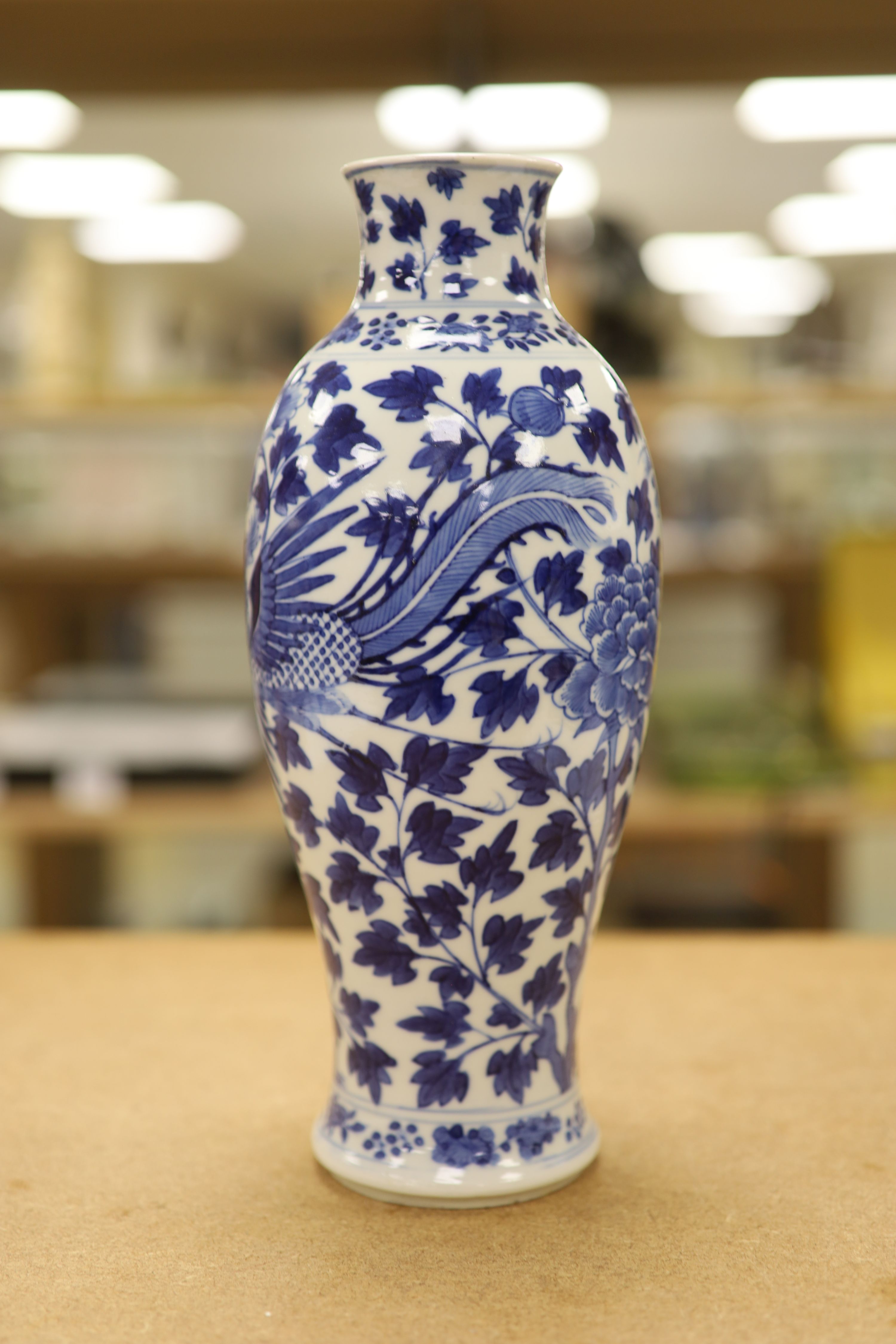 Two 19th century Chinese blue and white vases, decorated with phoenix, tallest 28cm (a.f)